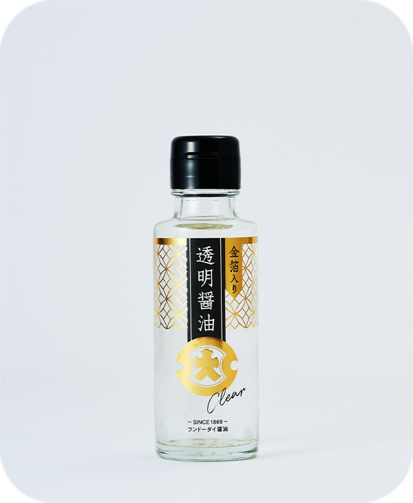 Clear soy sauce with gold leaf