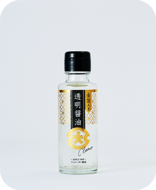 Clear soy sauce with gold leaf